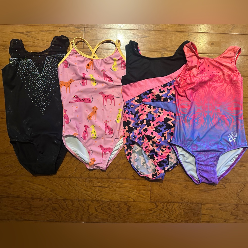 Girls gymnastic leotards size child medium. GK, Destira, Danskin freestyle.